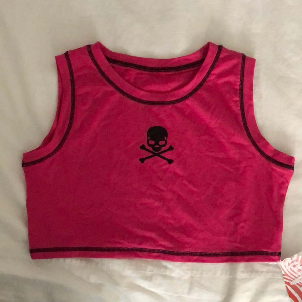 Cropped hot pink skeleton head top